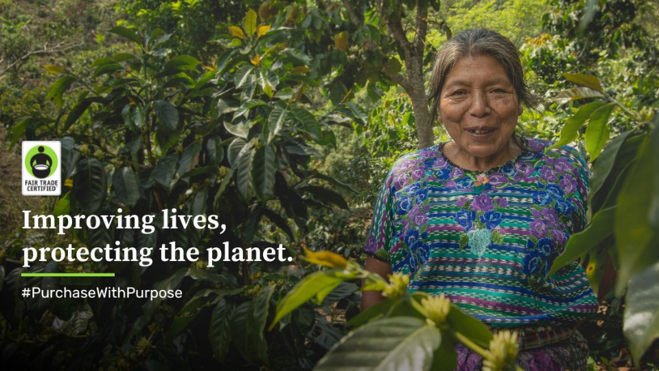 A female farmer standing outside, with the text overlay: Improving lives, protecting the planet #PurchaseWithPurpose
